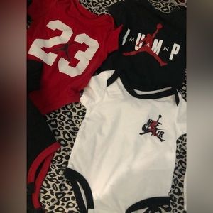 7 Jordan onesies